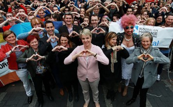 More than 1500 Rally for Free Vote on Marriage Equality (L-R)Christine Forster, Virginia Edwards, Greens Senator Sarah Hanson-Young, politician Tanya Plibersek (C), Jackie Stricker and Dr Kerryn Phelps make a love heart sign with their hands signalling for marriage equality on May 31, 2015 in Sydney, Australia. Demonstrators are calling on the government to allow for a free vote on marriage equality. (May 30, 2015 - Source: Lisa Maree Williams/Getty Images AsiaPac)