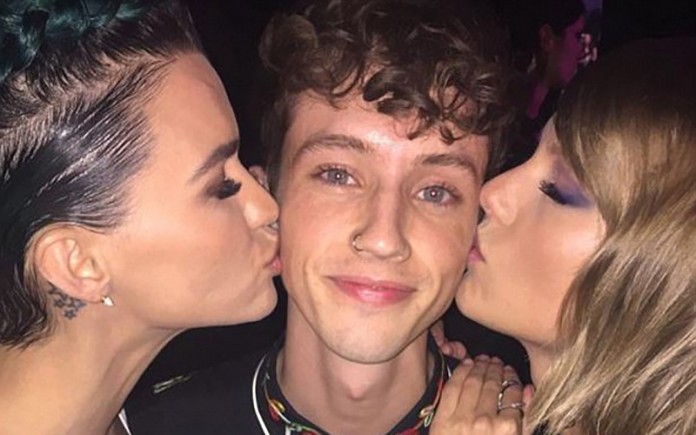 Troye Sivan sandwiched by Ruby Rose (L) and Taylor Swift (R) at the GLAAD Awards in LA on Saturday night - Source: Instagram