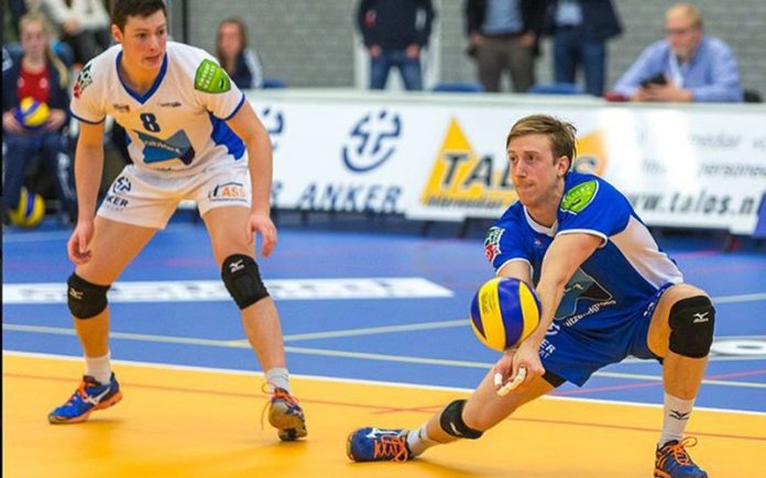 Chris Voth(Roght) digging a ball in a game in the Netherlands - Instagram @chrisvoth