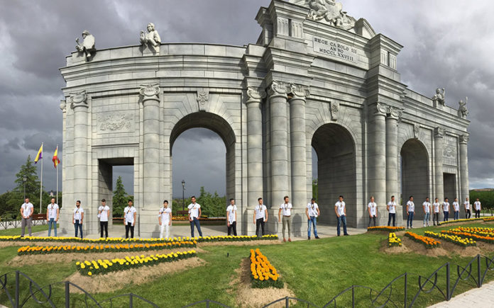 2017 Mr Gay World delegates standing in front of a replica of the Madrid Puerta de Alcalá at the Parque Europa on the outskirts of Madrid. (Mr Gay World)