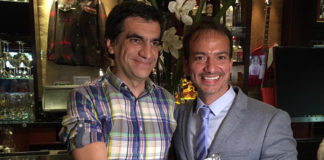 20 Years Of Service Rewarded for Long-Serving Madrid LGBT Veteran President of Mr. Gay World Eric Butter (r) presents his Philanthropy Award to Juan Carlos Alonso (Mr Gay World)