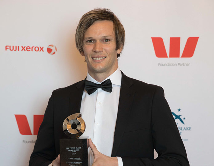 Aaron Fleming with his Sir Peter Blake Leadership Award on Friday night (Supplied)