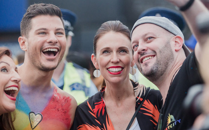 New Zealand Prime Minister Jacinda Ardern at the Auckland Pride Parade grabbing a selfie with Mr Gay Pride Australia 2018 Jordan Bruno - Source: Maria Ligaya http://www.marialigayaphotography.com