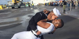 Gay US Sailor Kisses Husband Similar to Famous 1945 Victory Day Kiss The Boddingtons kiss on arrival back in Florida (US Navy)