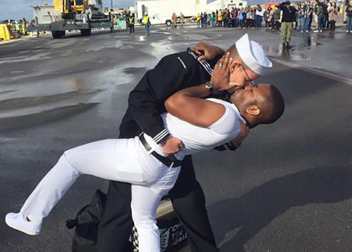 The Boddingtons kiss on arrival back in Florida (US Navy)