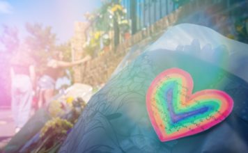 UK Terror Attack Victims All Gay Men reading terror flowers