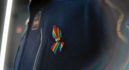 Rainbow flag pin on Branson's space suit (Twitter)