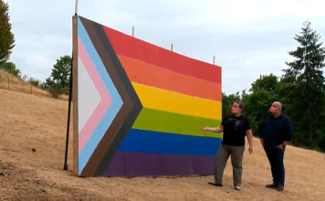 Farmers Erect Huge Progress Pride Flag on Hill After School Bans LGBT+ Symbols Progress Pride Flag erection in Oregon (KGW8)