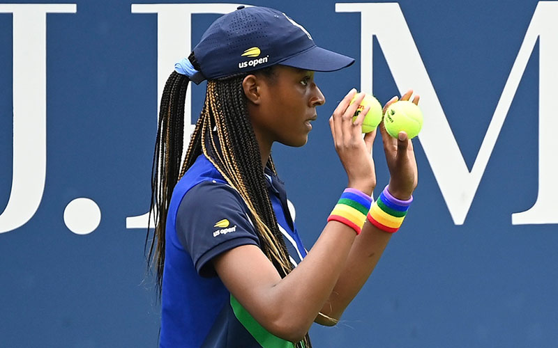 A ballperson wearing Pride wristbands in a match at the US Open. 