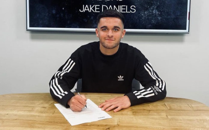 Jake Daniels signing his first major sponsorship deal with Adidas earlier in the week. (Instagram)