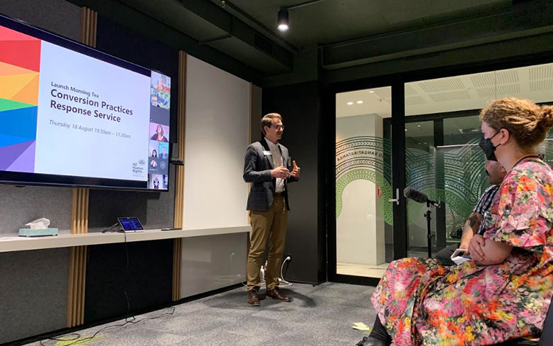 Matt Langworthy speaking at the launch, he is a survivor, and the Lived Experience Adviser in the Conversion Practices Response Team who developed the survivor strategy that underpins the service. (Supplied)