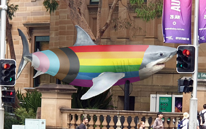 A Jurassic shark dressed in the progress flag outside the Australian Museum (Supplied)