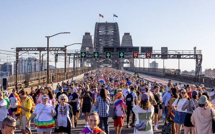 Sydney WorldPride 2023 Marchers send a powerful message as they marhc across the Sydney Harbour Bridge (Daniel Boud - supplied)