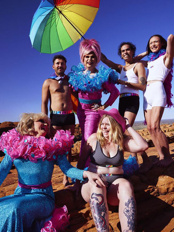 Drag Queens Miss Ellaneous and Marzi Panne with a group of LGBTQIA+ locals in the new season Bonds Pride range in Northern Territory. (Bonds)