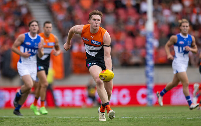 GWS Giants Tom Green prepares to handball in an AFL match. (Supplied)