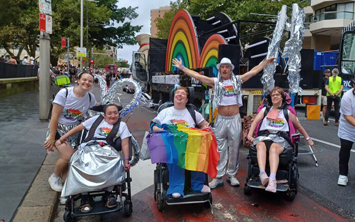 Clients and staff from CPA, Afford and Northcott celebrate the 2024 Sydney Gay and Lesbian Mardi Gras with the Ourtopia-themed float. (Facebook)