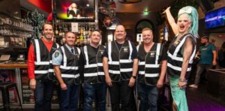 Oxford Street Strengthens LGBTQIA+ Safety with “PrideVis” Initiative L-R = Cr Adam Worling, City of Sydney; Supt Anthony Metcalfe, Commander Surry Hills PAC; Shane Warren, Chair Oxford Street Pride Business Charter; Richie Haines, Chair Surry Hills Liquor Accord; Glenn Hansen, Stonewall Hotel; Keira Billie (Supplied)