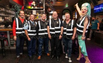 Oxford Street Strengthens LGBTQIA+ Safety with “PrideVis” Initiative L-R = Cr Adam Worling, City of Sydney; Supt Anthony Metcalfe, Commander Surry Hills PAC; Shane Warren, Chair Oxford Street Pride Business Charter; Richie Haines, Chair Surry Hills Liquor Accord; Glenn Hansen, Stonewall Hotel; Keira Billie (Supplied)