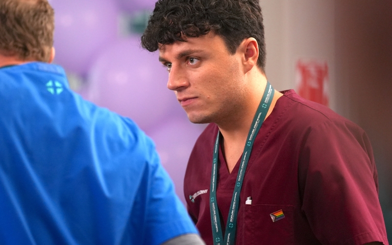 Peter Burman as Sage Stewart showing the progress flag pin on his Shortland Street uniform. (Supplied)